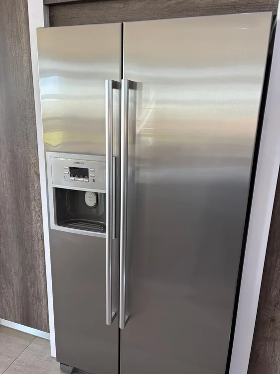 Technician providing freezer repairs in Umdloti