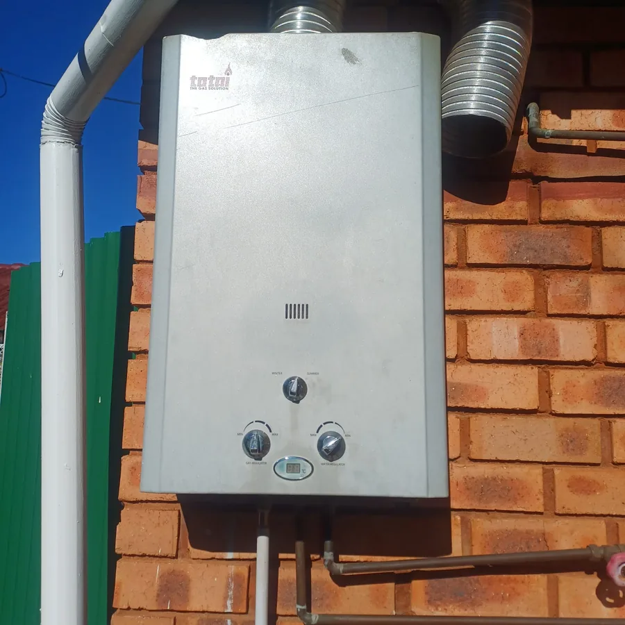 Technician providing geyser repair service in Ballito