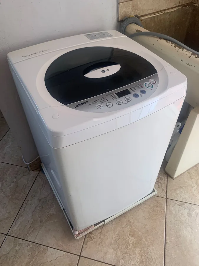 Technician providing washing machine repairs in Seaward Estate